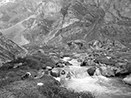 Taking holy bath and offering oblations at 12500ft. in freezing cold Rishi Ganga River, at base of and…