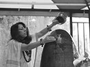 Offering sacred abhishekam (bath) to MahaLingam at KSN, San Jose, CA 2009